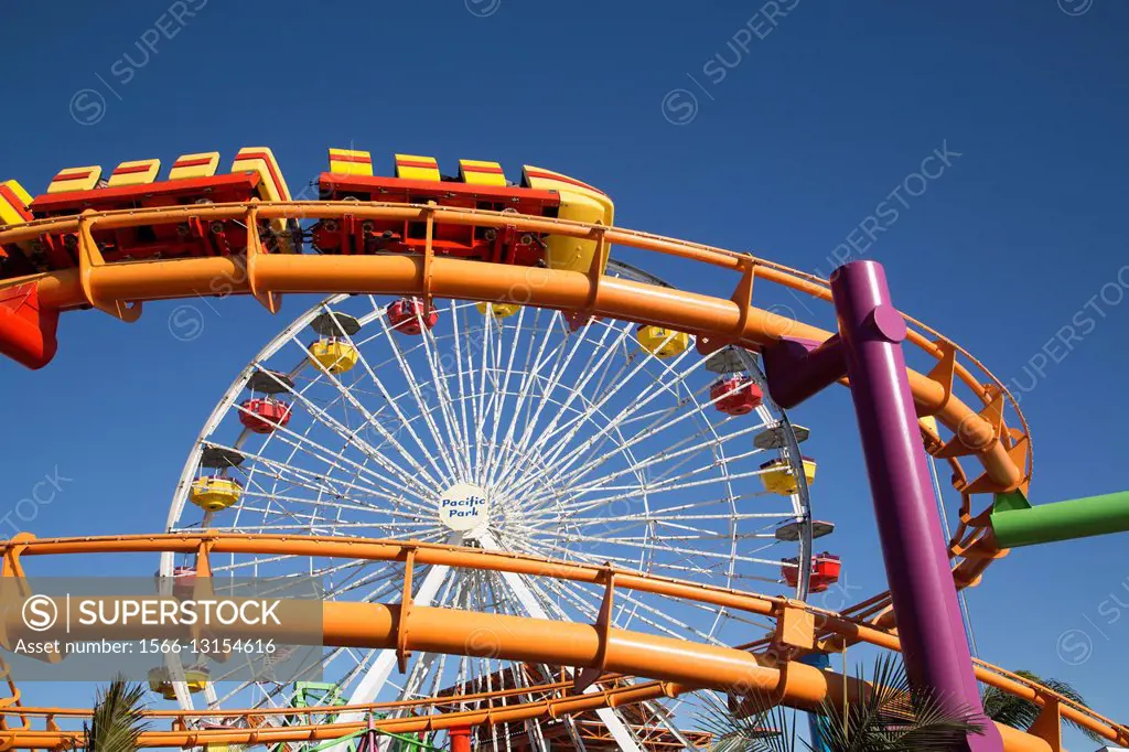 Roller Coaster and Ferris Wheel, Pacific Park, Santa Monica, California, USA