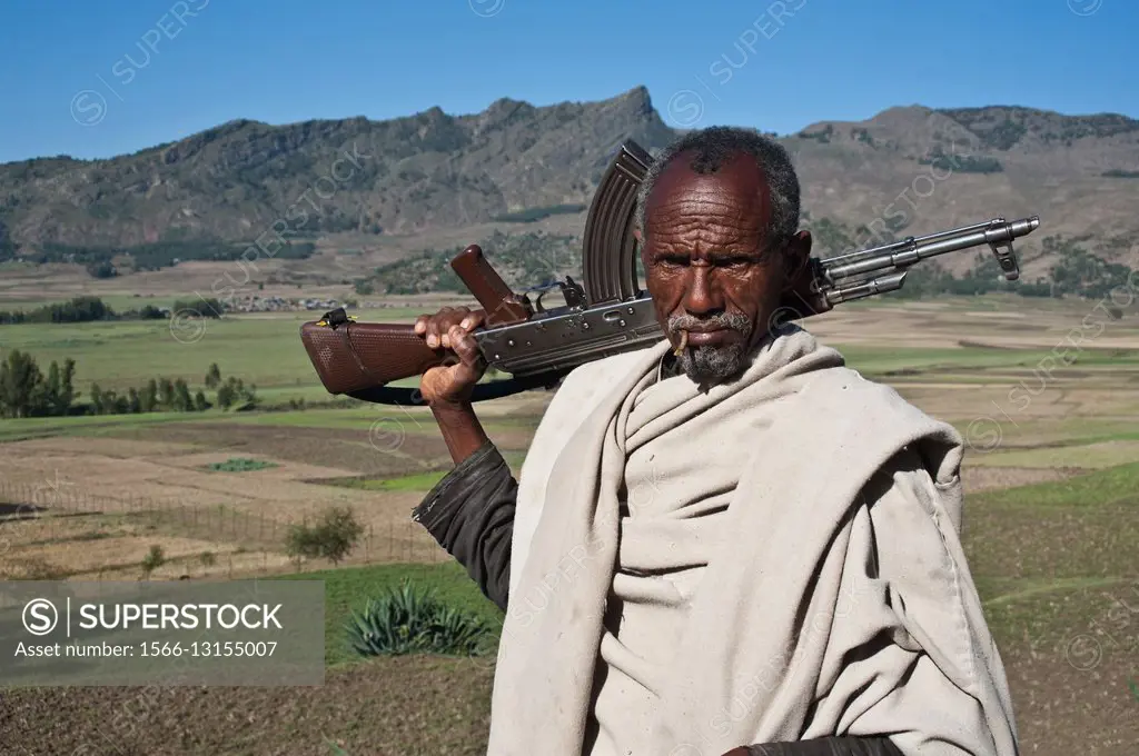 Farmer with Kalashnikov. Near Korem ( Tigray state, Ethiopia).