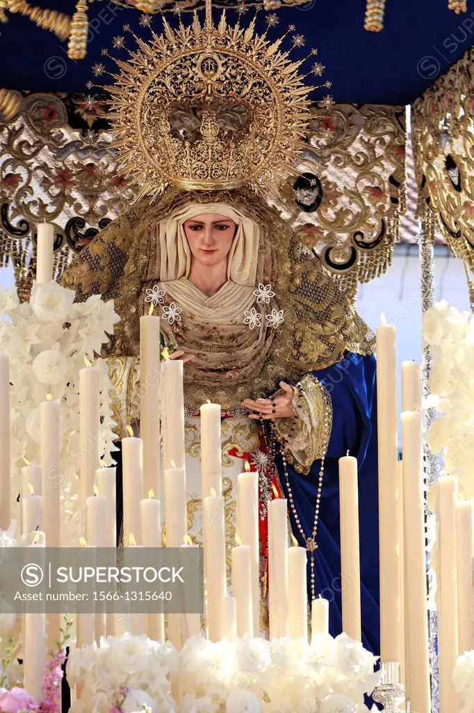Cedar wood carving of Virgen del Amor Hermoso during procession of Holy Week, Linares, Jaén, Andalusia, Spain.