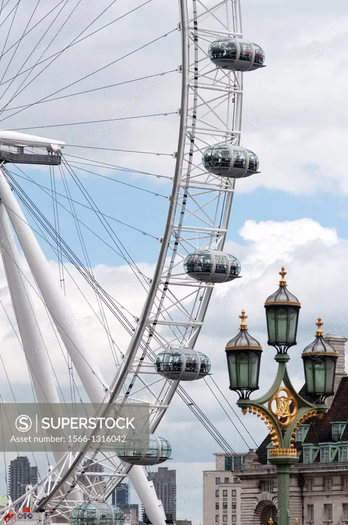England, London, London Eye viewed from Westminster Bridge.