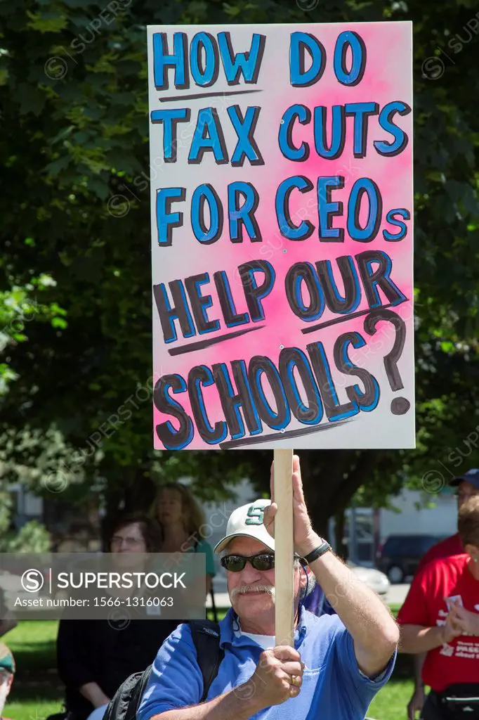 Lansing, Michigan - Parents and teachers rally at the state capitol to save Michigan's public schools. They criticized reduced spending for education ...