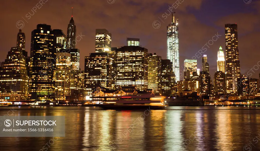 On background Lower Manhattan Skyline seen from Brooklyn, East River, Manhattan, New York, New York City, United States, USA.