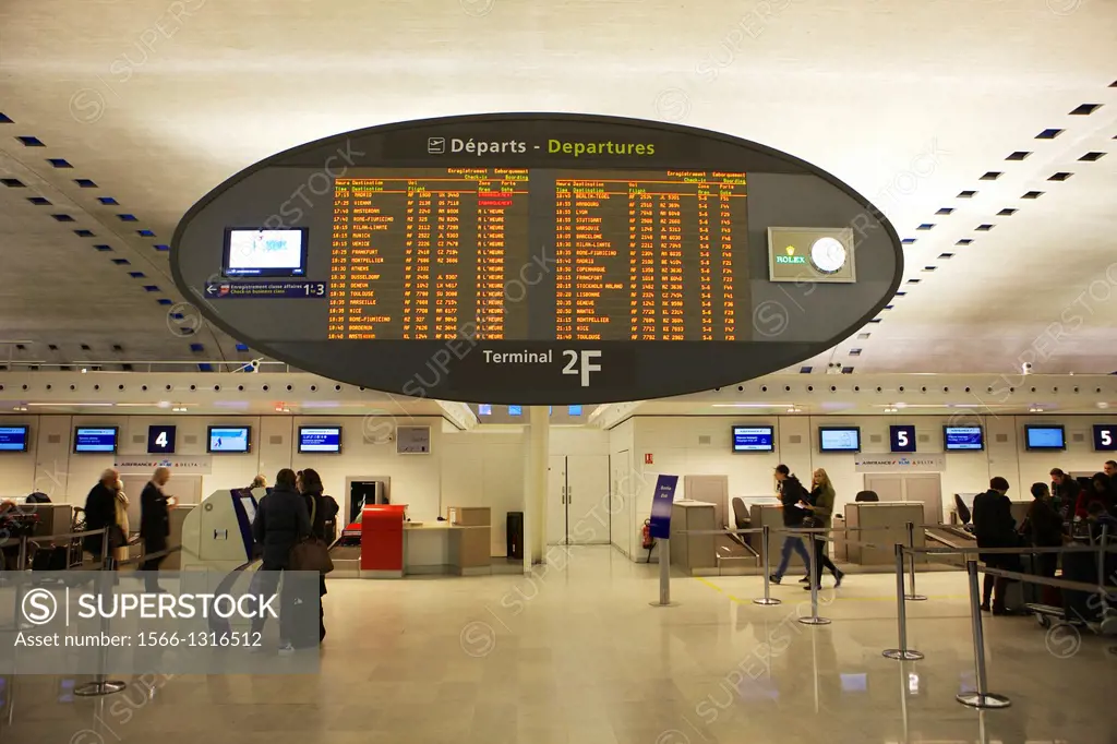 Panel with departure times inside the Roissy Charles de Gaulle airport in France