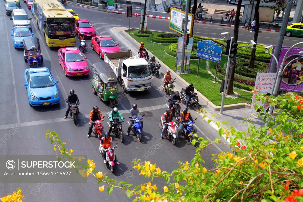 Thailand, Bangkok, Pathum Wan, Phaya Thai Road, traffic, taxi, taxis, cabs, motorcycles, motor scooters, buses, auto rickshaw, tuk-tuk, sam-lor, Skywa...