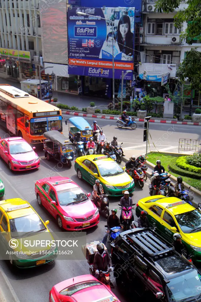 Thailand, Bangkok, Pathum Wan, Rama 1 Road, traffic, taxi, taxis, cabs, motorcycles, motor scooters, bus, auto rickshaw, tuk-tuk, sam-lor, Skywalk, vi...
