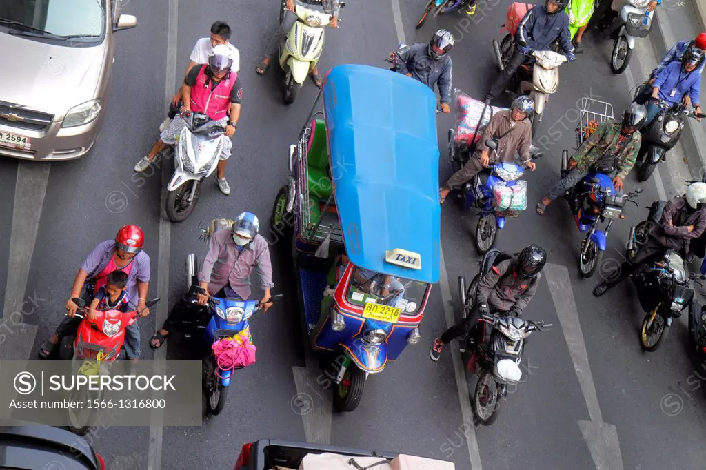 Thailand, Bangkok, Pathum Wan, Phaya Thai Road, traffic, taxi, taxis, cabs, motorcycles, motor scooters, auto rickshaw, tuk-tuk, sam-lor, Skywalk, vie...