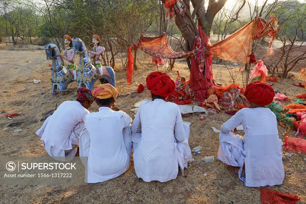 India, Rajasthan, Meda village around Jodhpur, Rabari ethnic group, prayer at Mata Mandir (Mother temple).