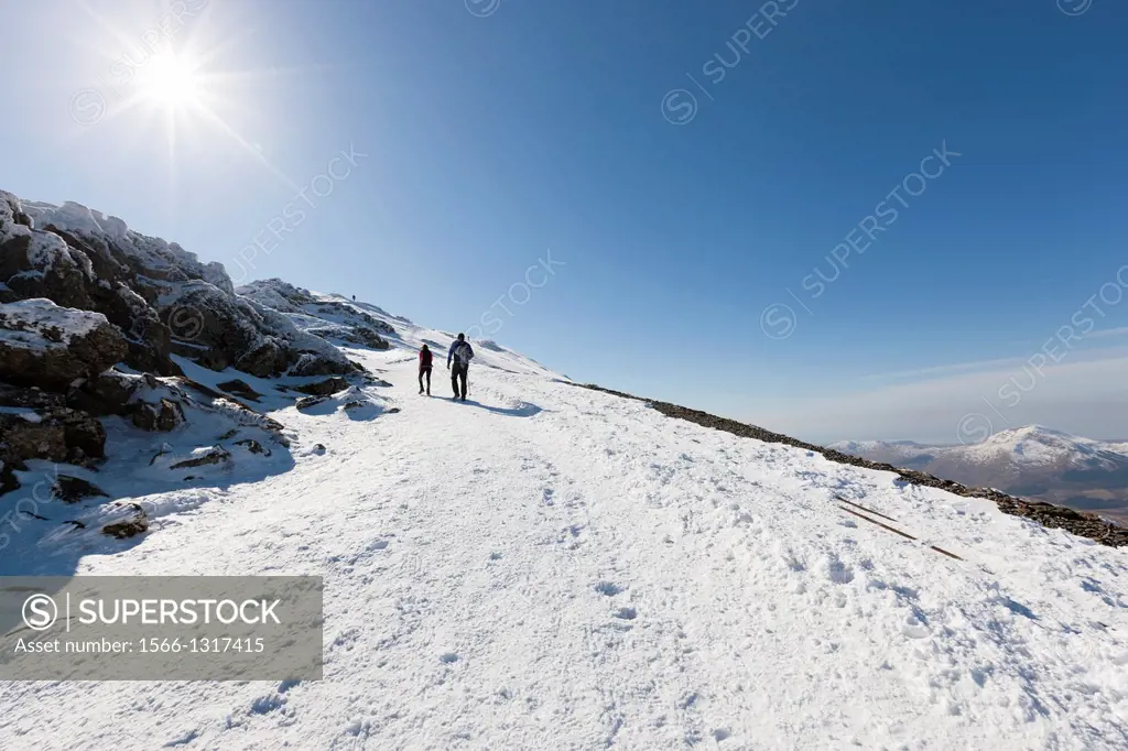 Tourists walking in Snowdon summit, Snowdonia National Park, Wales, UK, Europe.