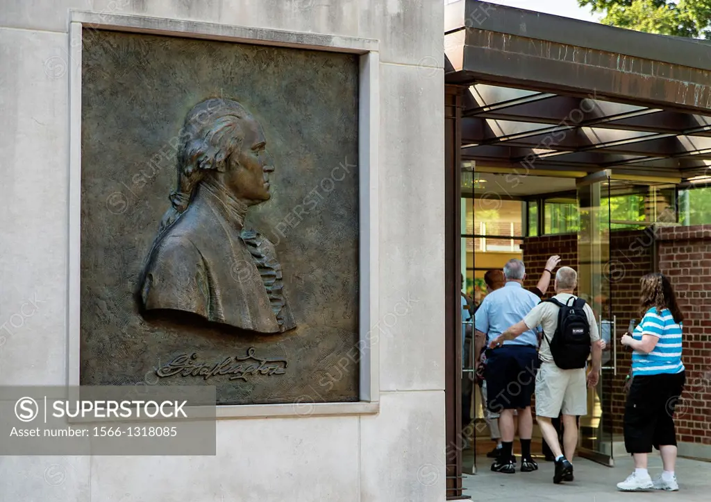 Bronze relief of George Washington guides tourists to the visitors center at Mt Vernon, Virginia, USA.