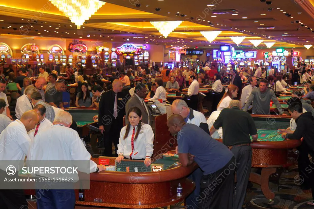 Nevada, Las Vegas, The Strip, South Las Vegas Boulevard, Bally's Las Vegas Hotel and Casino, gambling, gamblers, players, base dealer, craps, tables, ...