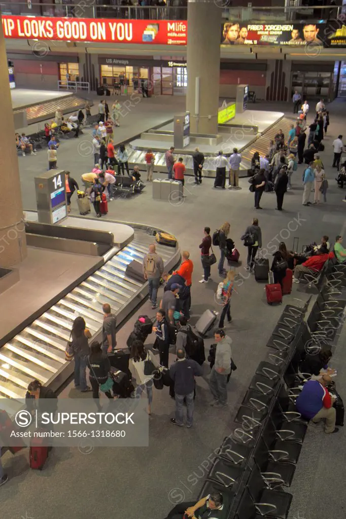 Nevada, Las Vegas, McCarran International Airport, LAS, terminal, overhead, baggage claim area, luggage, conveyor belt, arriving passengers.