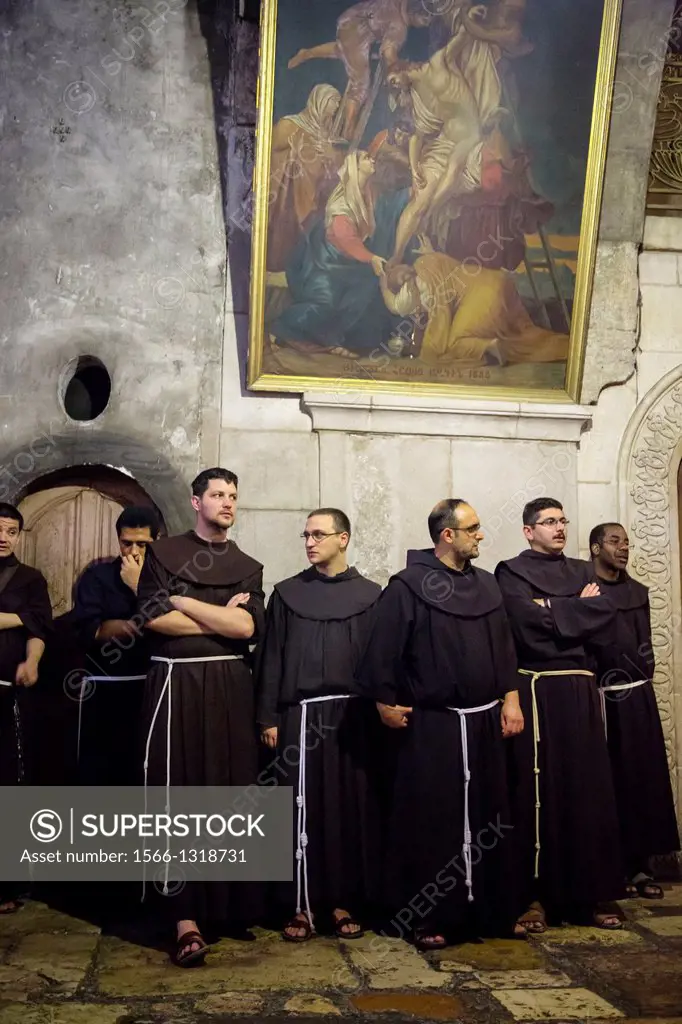 Franciscan monks at the church of the Holy Sepulchre in the old city, Jerusalem, Israel.
