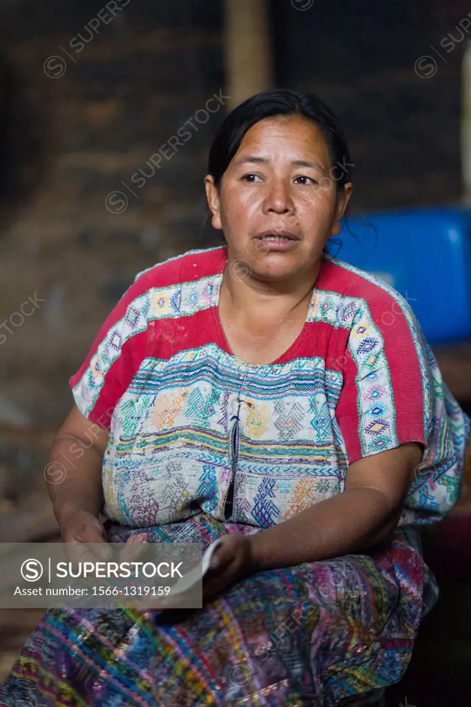 Guatemala, San Jose Poaquil, woman making tortillas.