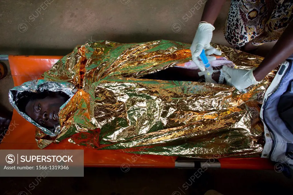 HIV aids patient wrapped in alluminium foil to keep warm in hospital in CAR.