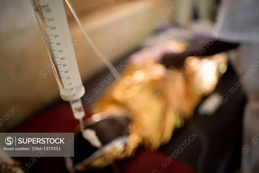HIV aids patient wrapped in alluminium foil to keep warm in hospital in CAR.