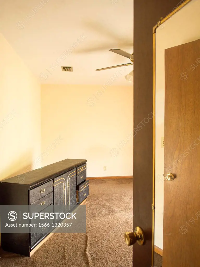 Mirror and room inside a foreclosed home in Talahassee, Florida, United States.