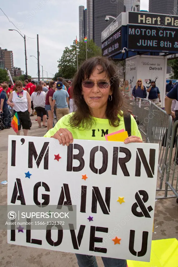 Detroit, Michigan - As ggay and lesbian activists march for equality in the Motor City Pride parade, a church member apologizes for the anti-gay actio...