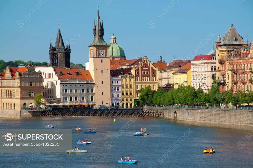 Pedalos and boats in front of old town Prague city Czech Republic Europe.