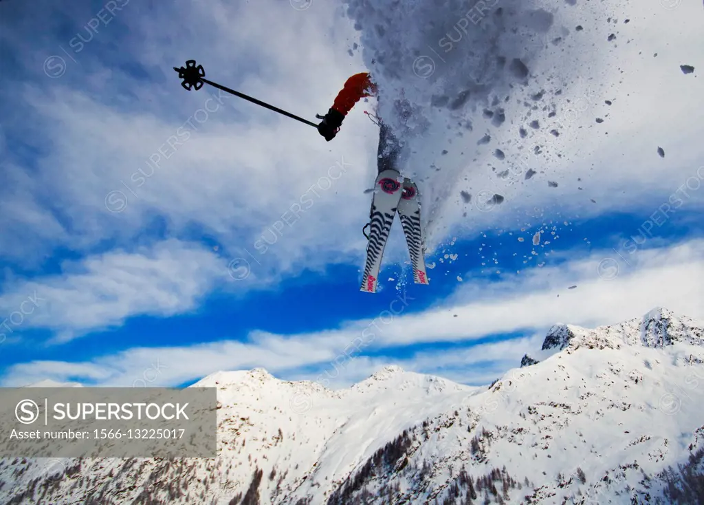 A freerider jumps from a roof of a pasture hut in Valtartano, Valtellina, Italy.