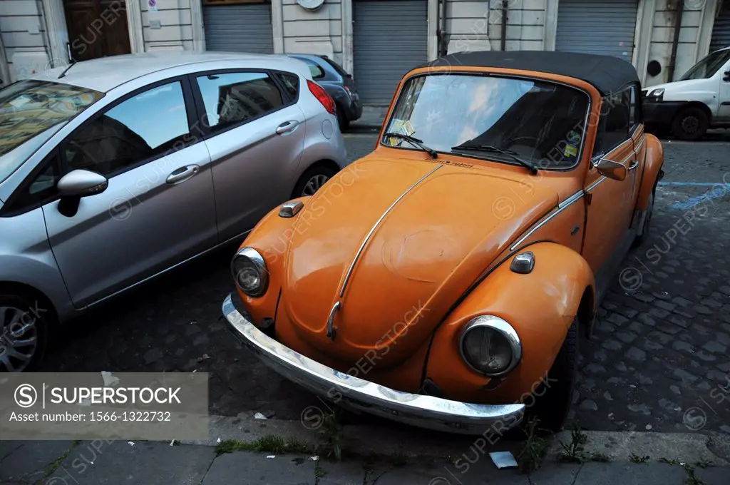 Old Orange VW Beetle in Rome