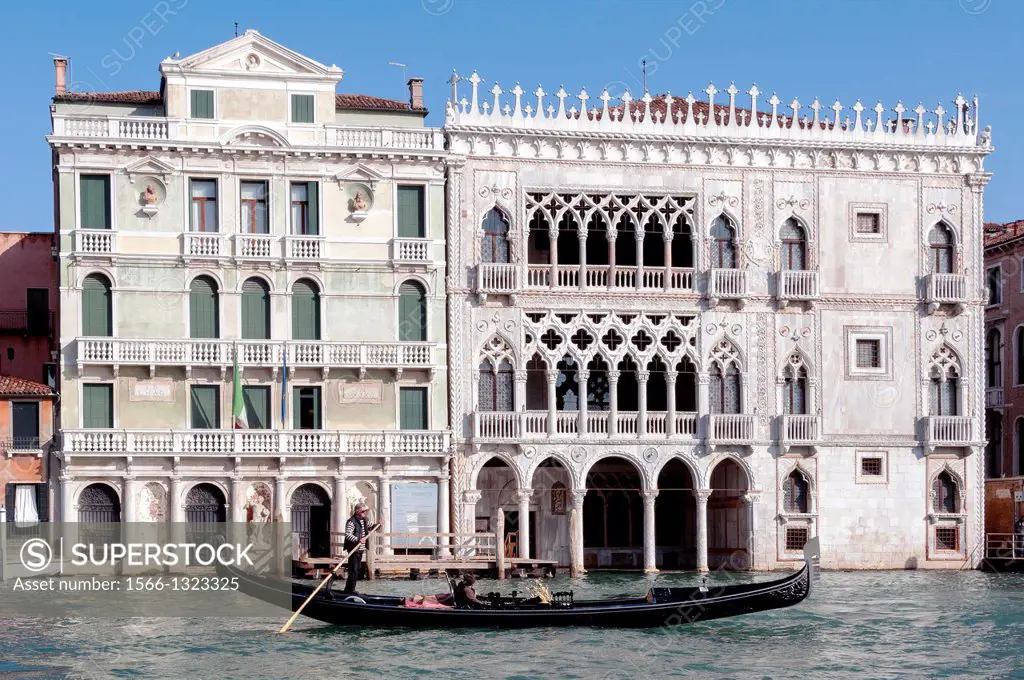 Europe, Italy, Veneto, Venice, classified as World Heritage by UNESCO. Gondola in front of palace Ca´ D´Oro Gold House on the Grand Canal.