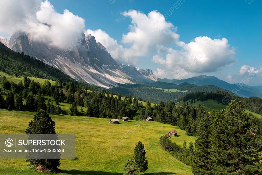 Funes Valley, Dolomites, South Tyrol, Italy. The Barns on the Malga Caseril/Kaserillalm. In the background the peaks of the Odle.