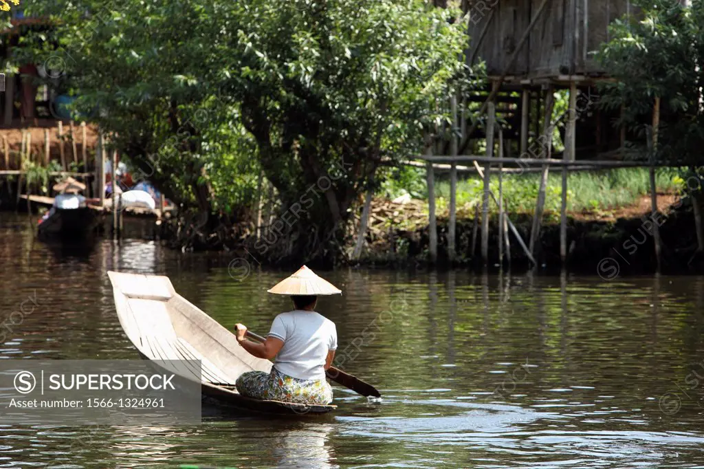 WOODEN BOATS are the main form of transportation on INLE LAKE, Burma