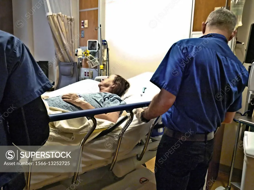 Hospital patient on a gurney following surgery. (Only the patient is model released).