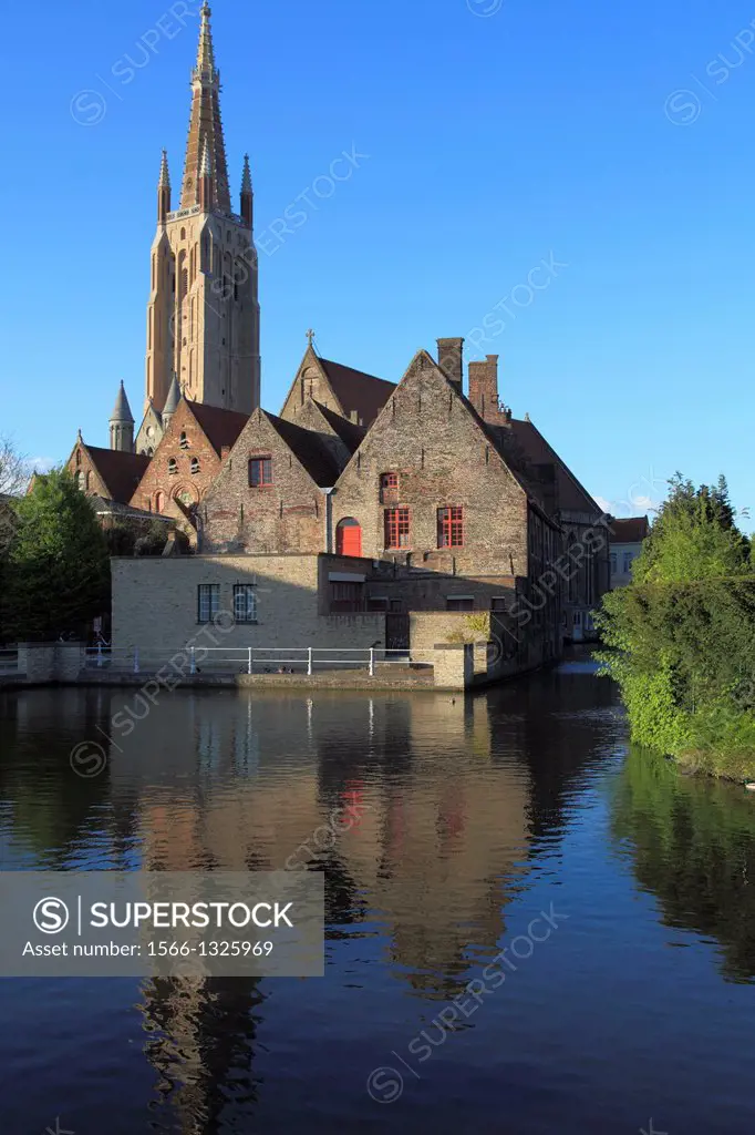 Belgium, Bruges, Church of Our Lady, canal scene,.