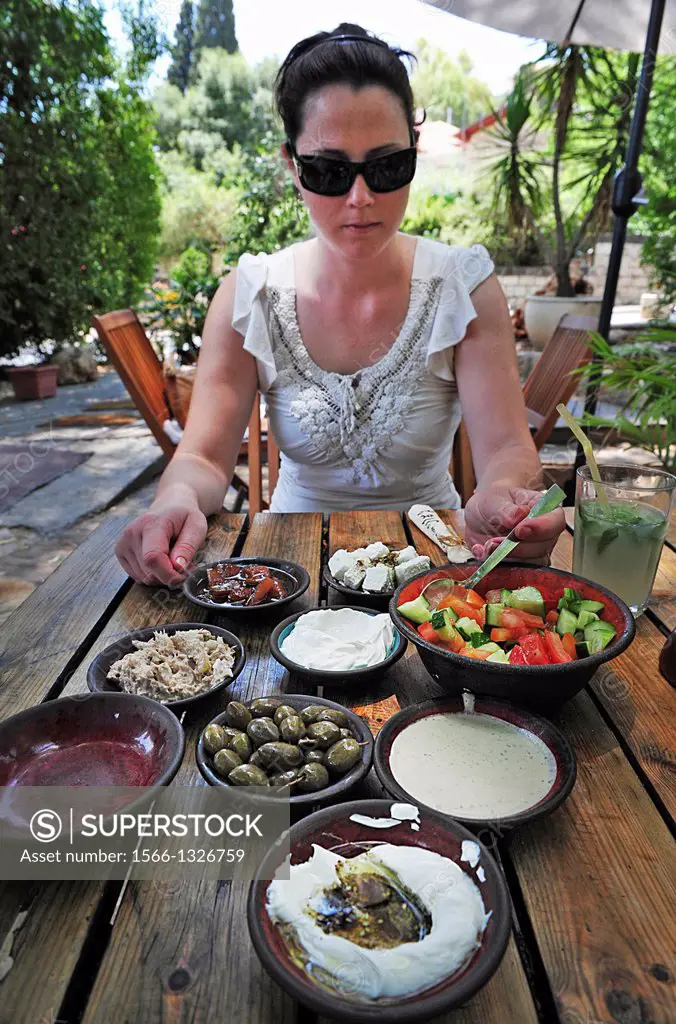 Traditional Israeli breakfast in a restaurant in Rosh Pinna town located in the Upper Galilee on the Northern District of Israel.