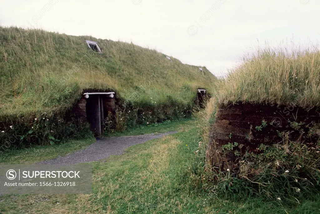 CANADA, NEWFOUNDLAND, L'ANSE AUX MEADOWS NHP, REPLICAS OF NORSE SOD HOUSES FROM 1000 YEARS AGO.