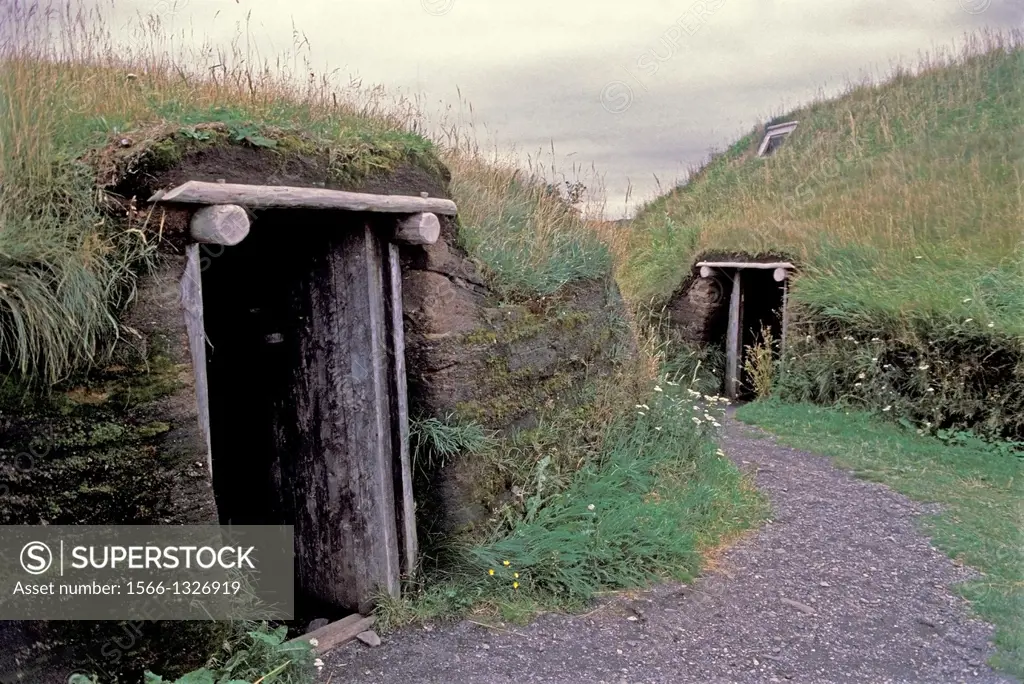 CANADA, NEWFOUNDLAND, L'ANSE AUX MEADOWS NHP, REPLICAS OF NORSE HOUSES FROM 1000 YEARS AGO.