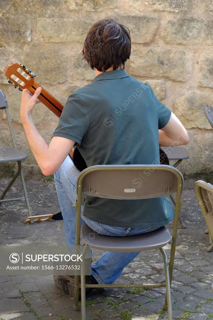 Practicing guitar alone