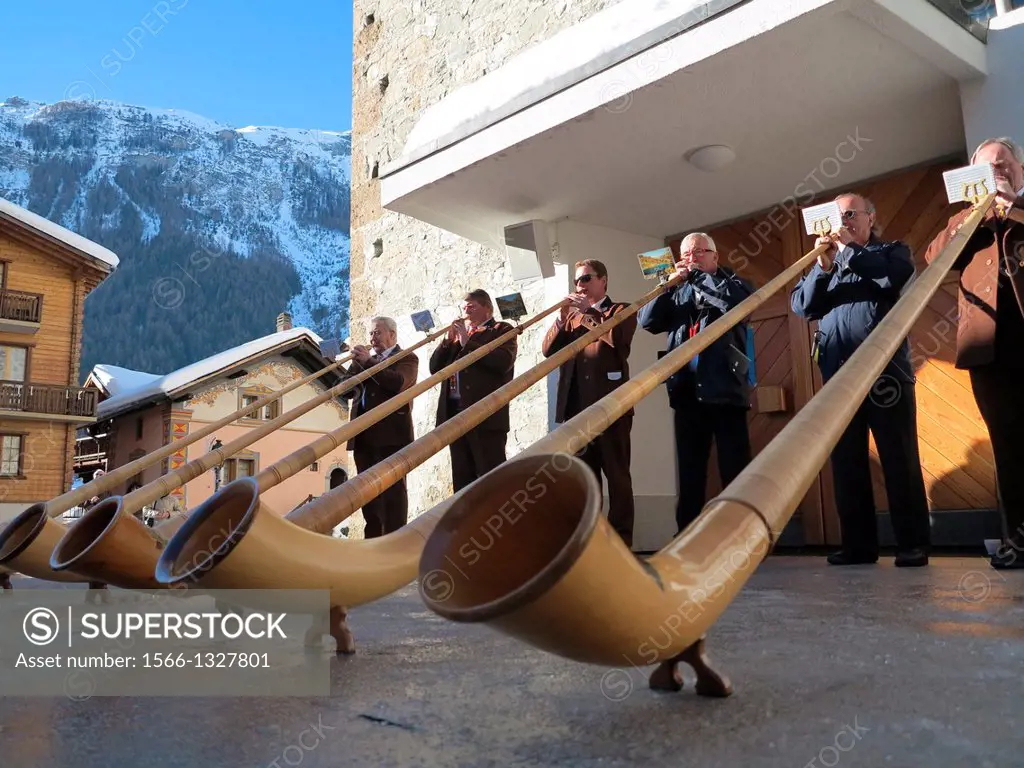 Switzerland, Valais, Herens valley, Evolene, new year mass with alp horn players