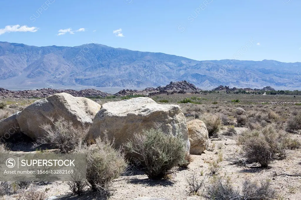 The Owens Valley is a desert landscape filled with large granite boulders in Central California.