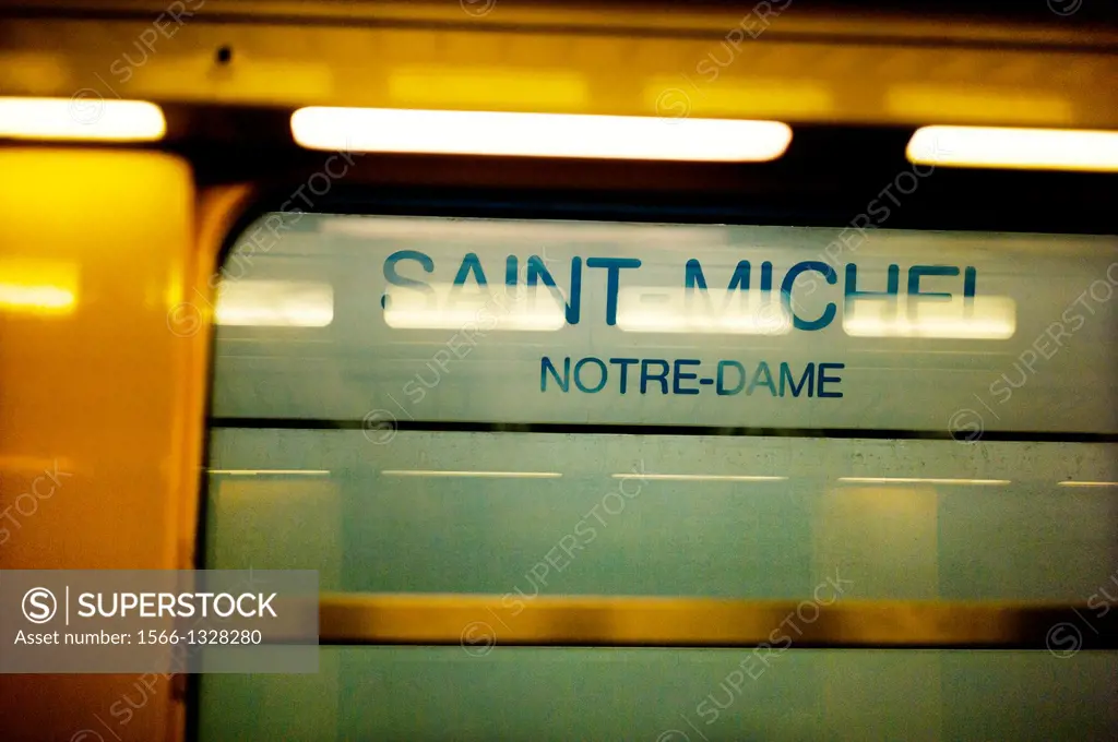 platform indication of Saint-Michele Notre-Dame, seen from the wagon of the Metro in Paris, France.