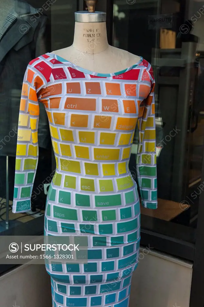 Mannequin printed with computer keyboard on display in the window of the Bri-tex fabric store. 