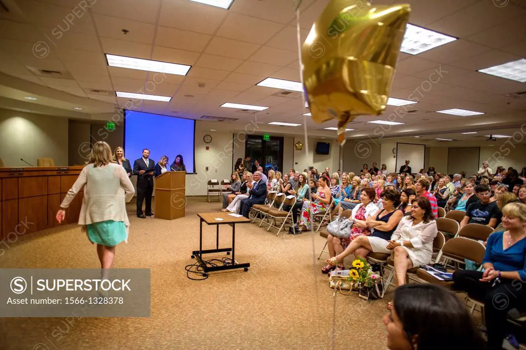 An Adult Transition Program (ATP) student receives her diploma at graduation in San Juan Capistrano, CA. The ATP combines classes and community experi...