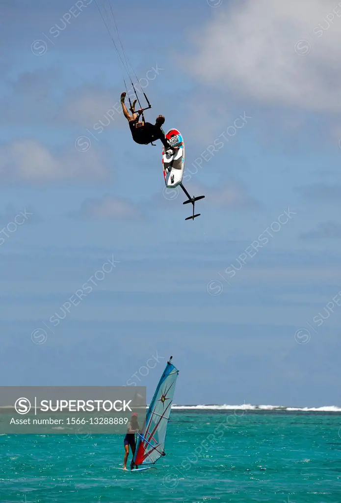 foilboard in the air above windsurfer on the water, new fast surfing sport - Foil boarding, Pointe d´Esny beach, Grand Port District, Southeastern coa...