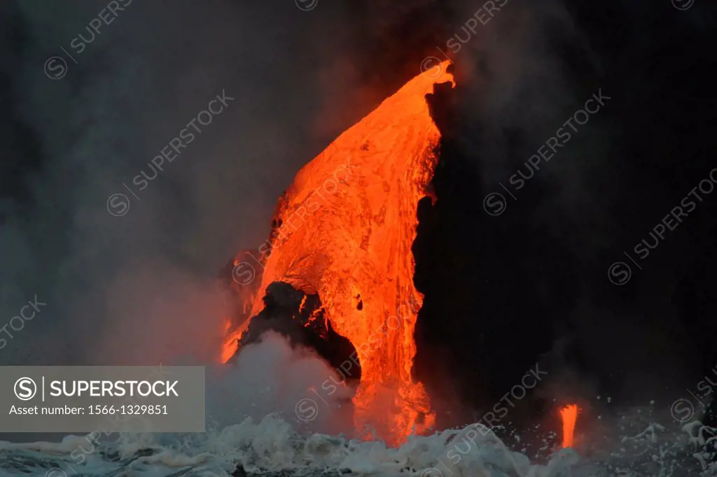 Lava from Kilauea Volcano flowing into the ocean, Hawaii Volcanoes National Park, Big Island, Hawaii, USA.