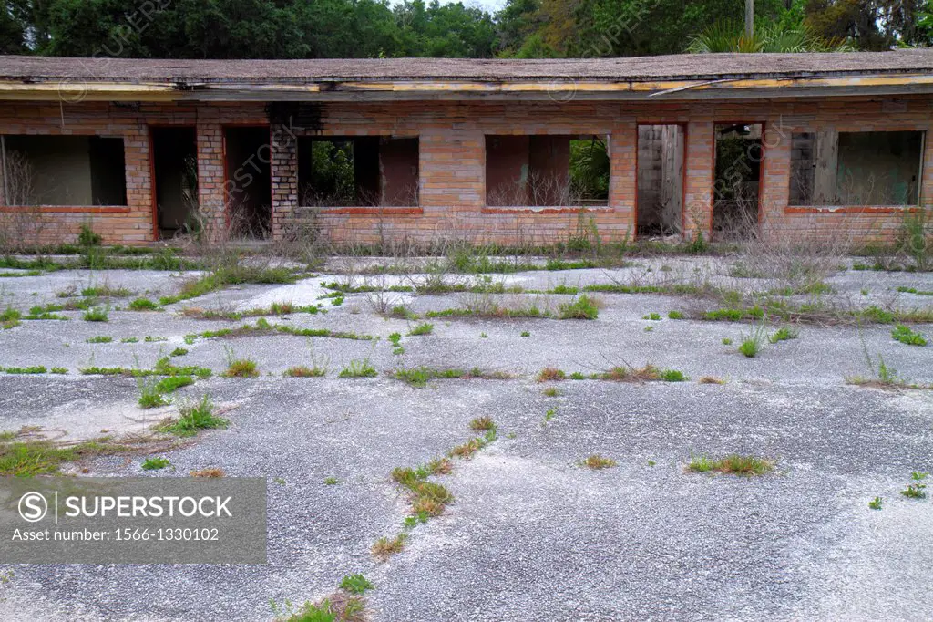 Florida, Perry, Highway Route 98, abandoned motel, vacant, condemned, weeds,.