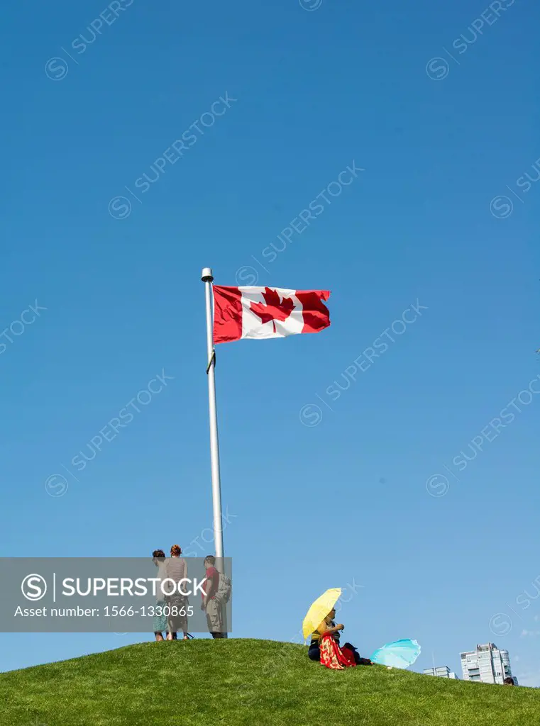 Canadian flag at the top of Ron Basford park on Granville Island, Vancouver, BC, Canada, for Canada Day, July 1.