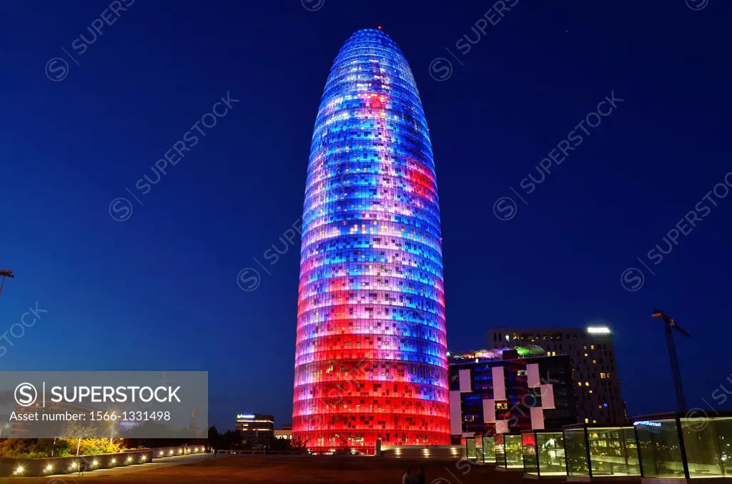 Torre Agbar, Agbar Tower at night. It was designed by French architect Jean Nouvel in association with the Spanish firm B720 Arquitectos and built by ...