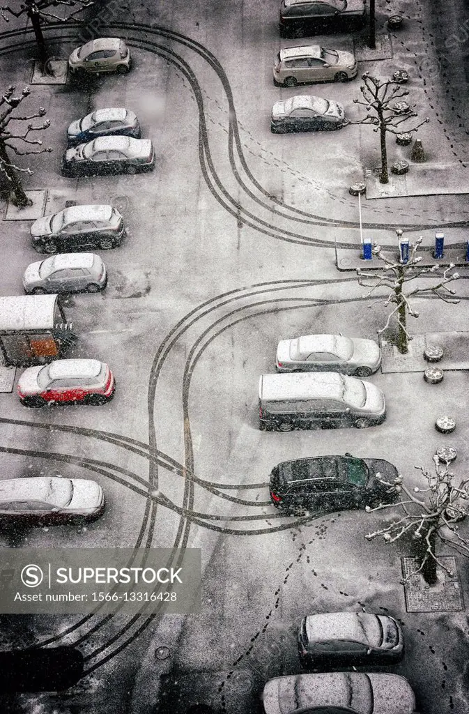 patterns created by cars in fresh snow in seen from above, Geneva, Switzerland, Europe