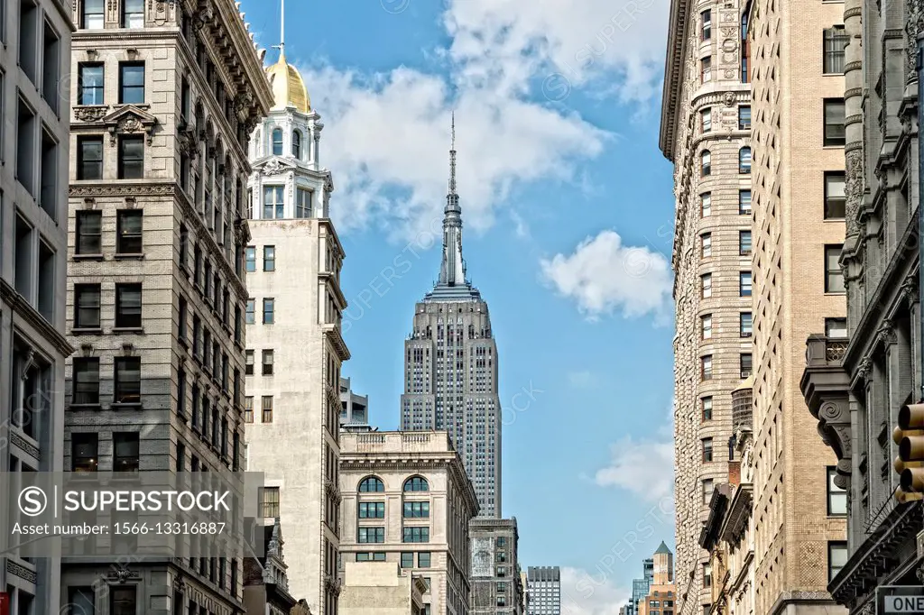 Manhattan, NYC. Looking North up Fifth Avenue from East 20th Street, in the Flatiron District. Empire State Building in the Distance.