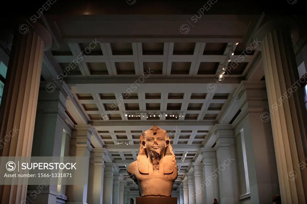 Colossal statue of Amenhotep III in Department of Ancient Egypt and Sudan. London. England. United Kingdom.