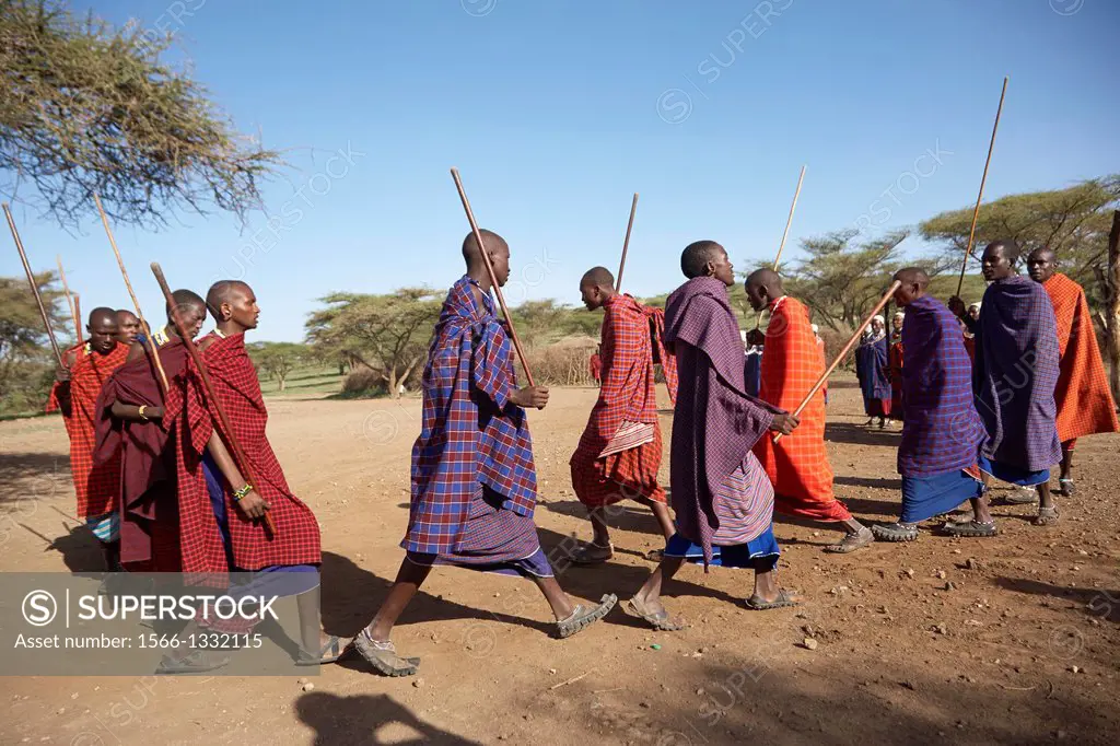 A group of Maasai men doing a traditional dance. Serengeti. Tanzania.