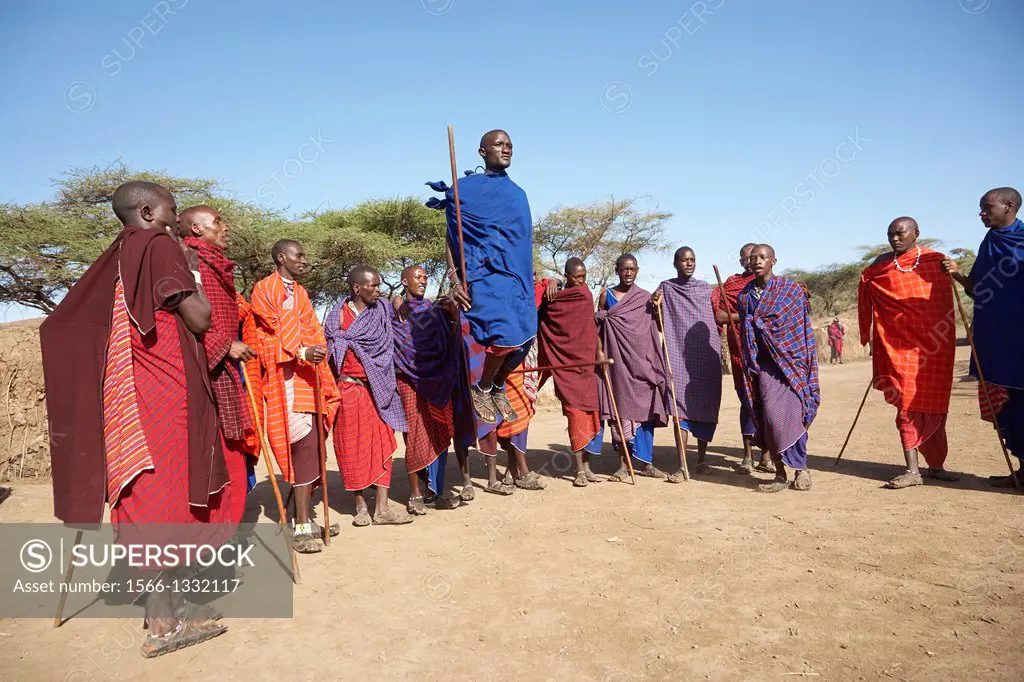 A group of Maasai men doing a traditional dance. Serengeti. Tanzania.