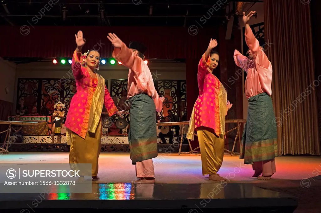 Performing Malay dance at Sarawak Cultural Village, Malaysia.