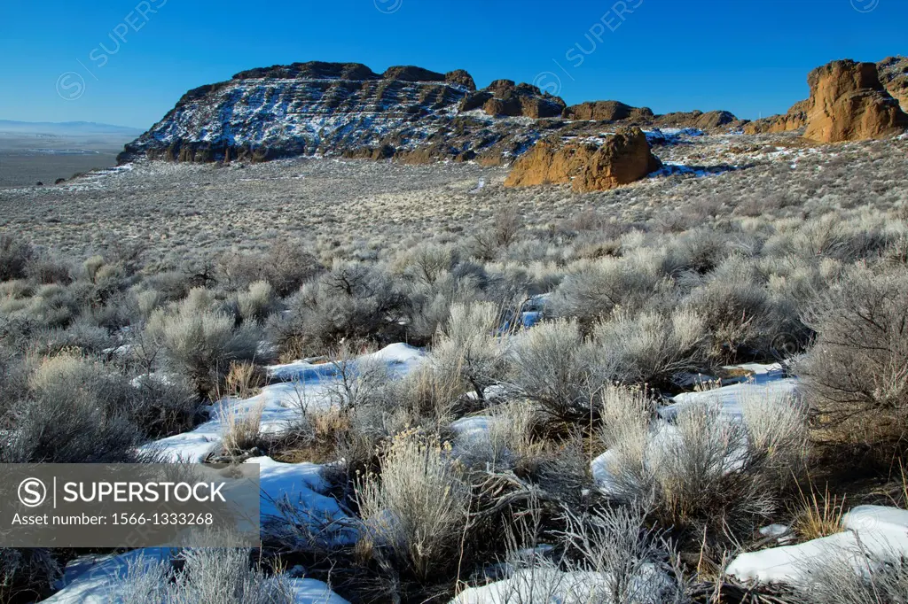 Fort Rock desert to outcrop, Fort Rock State Park, Christmas Valley National Back Country Byway, Oregon.